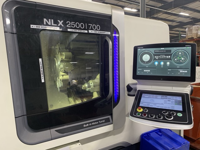 CNC equipment on the shop floor at Applied Components Manufacturing