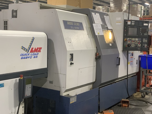 Machining area with production equipment at Applied Components Manufacturing